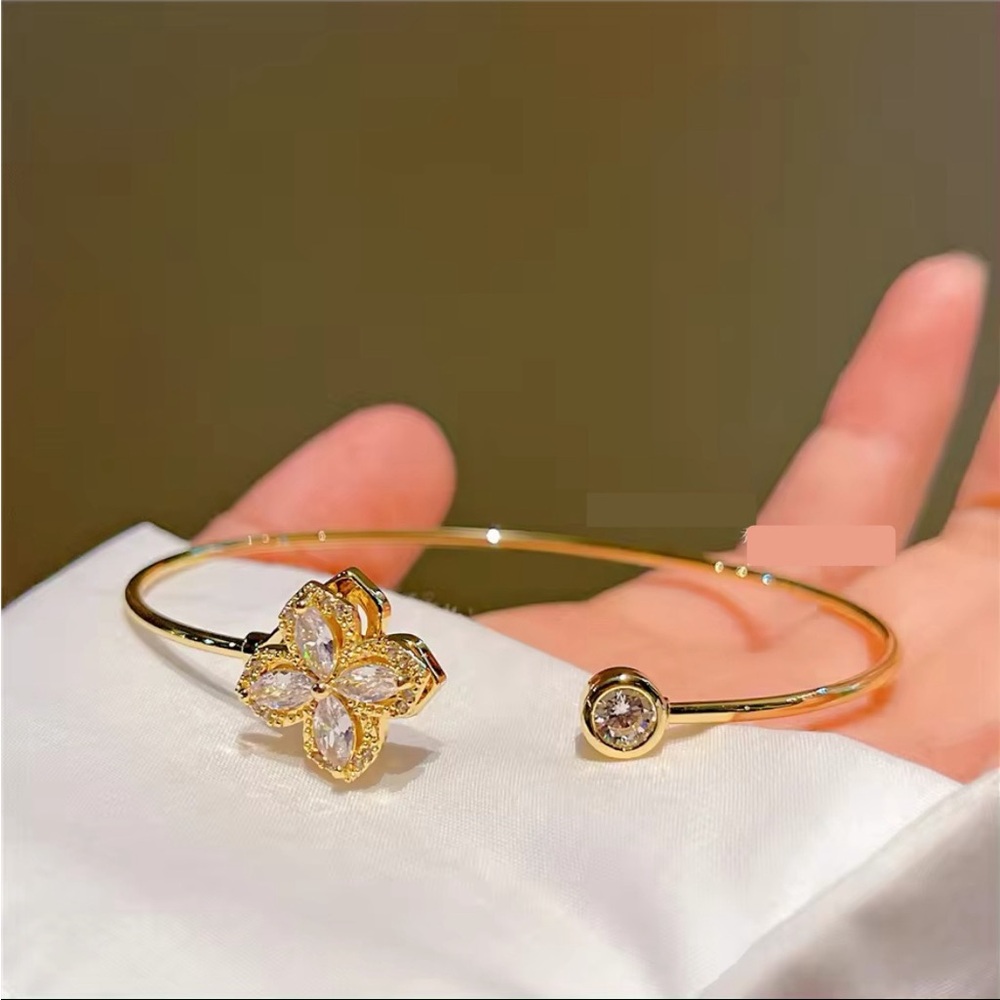 Quincy - Rotate 18K Gold Plated, cubic Zirconia Bracelet. NWT